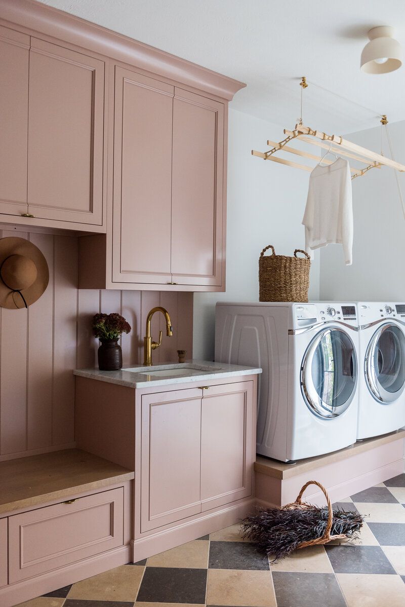 Laundry room with angled checkerboard floors.