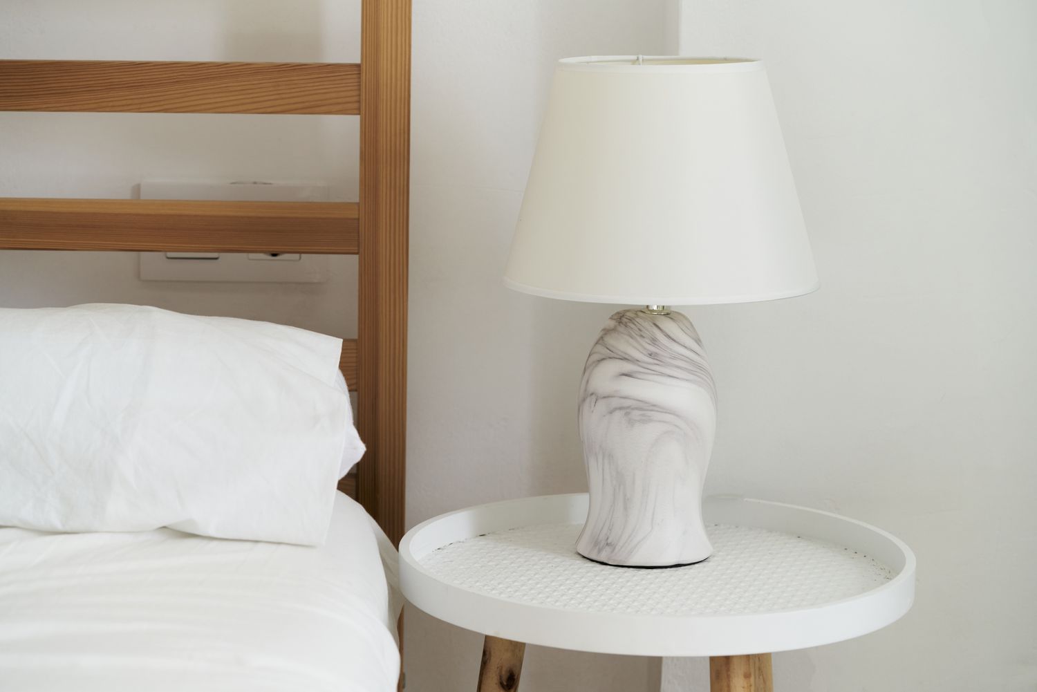 white marble lamp on end table