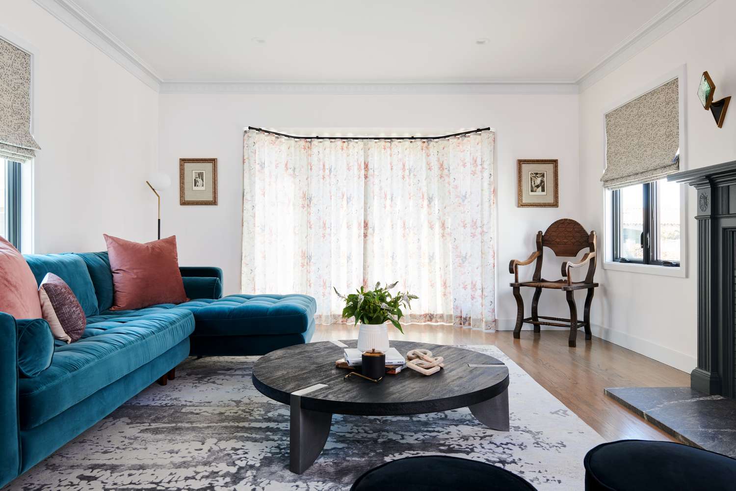 living room with decorative window treatments