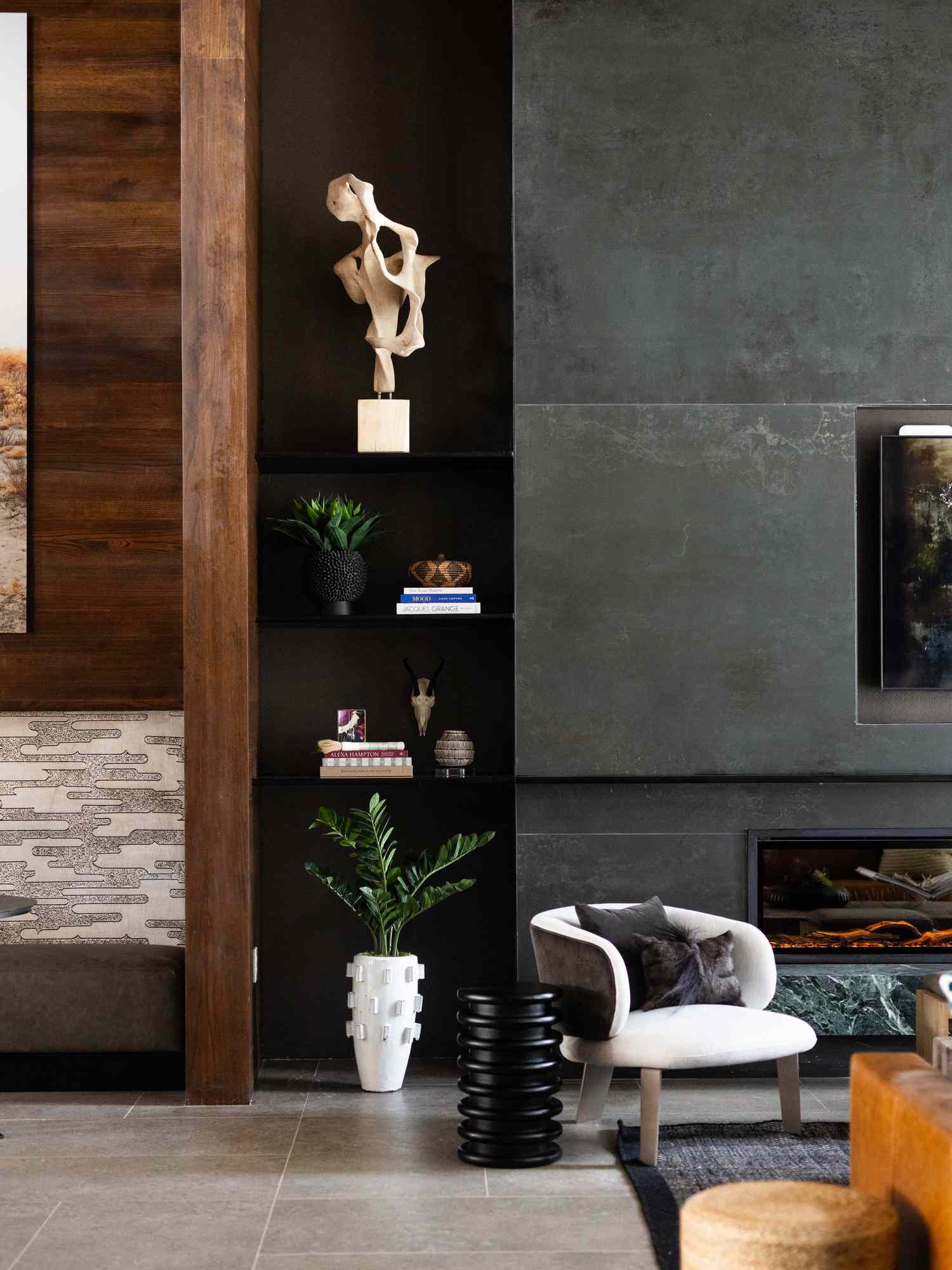 plant styled in base of bookshelf