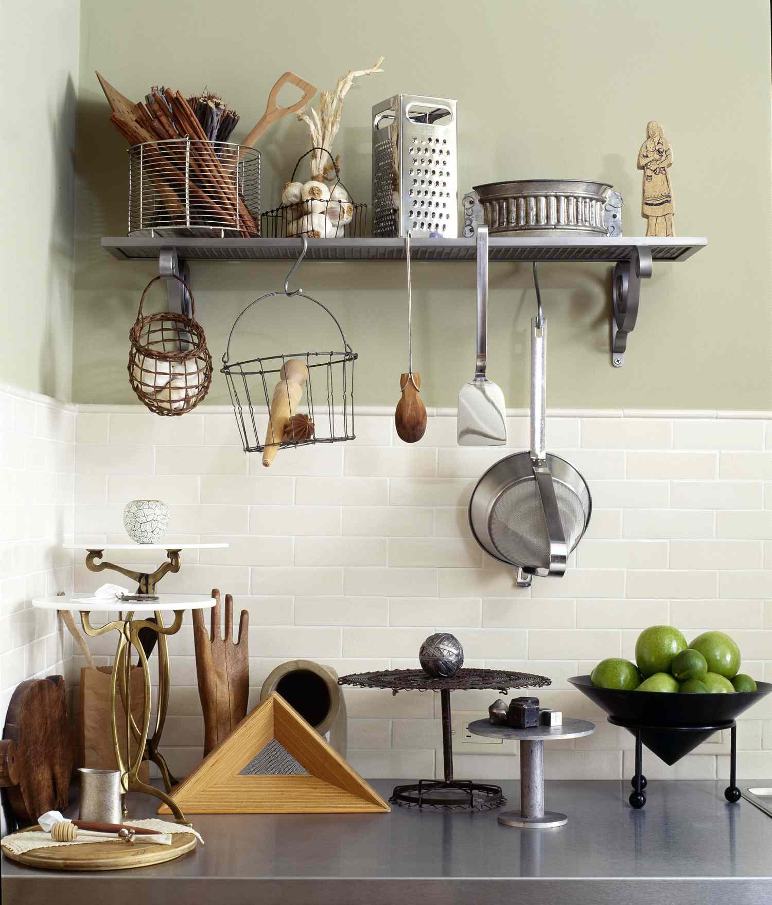 cluttered looking items on open shelving