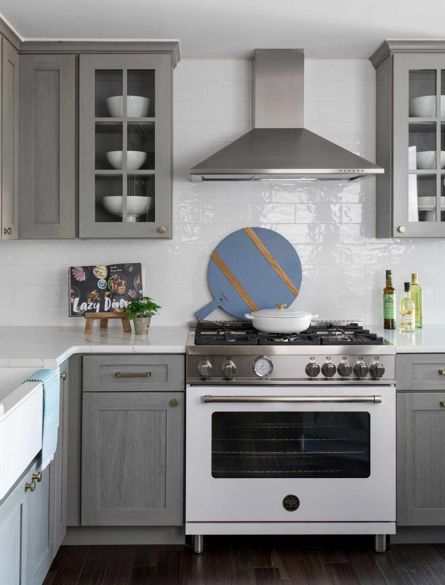 white dishes behind glass cabinets