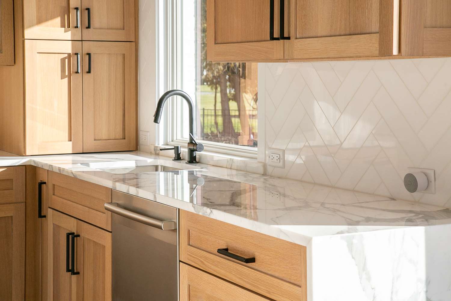 Kitchen design by Nina Pagonis using Nemo Tile + Stone subway tile in herringbone layout.