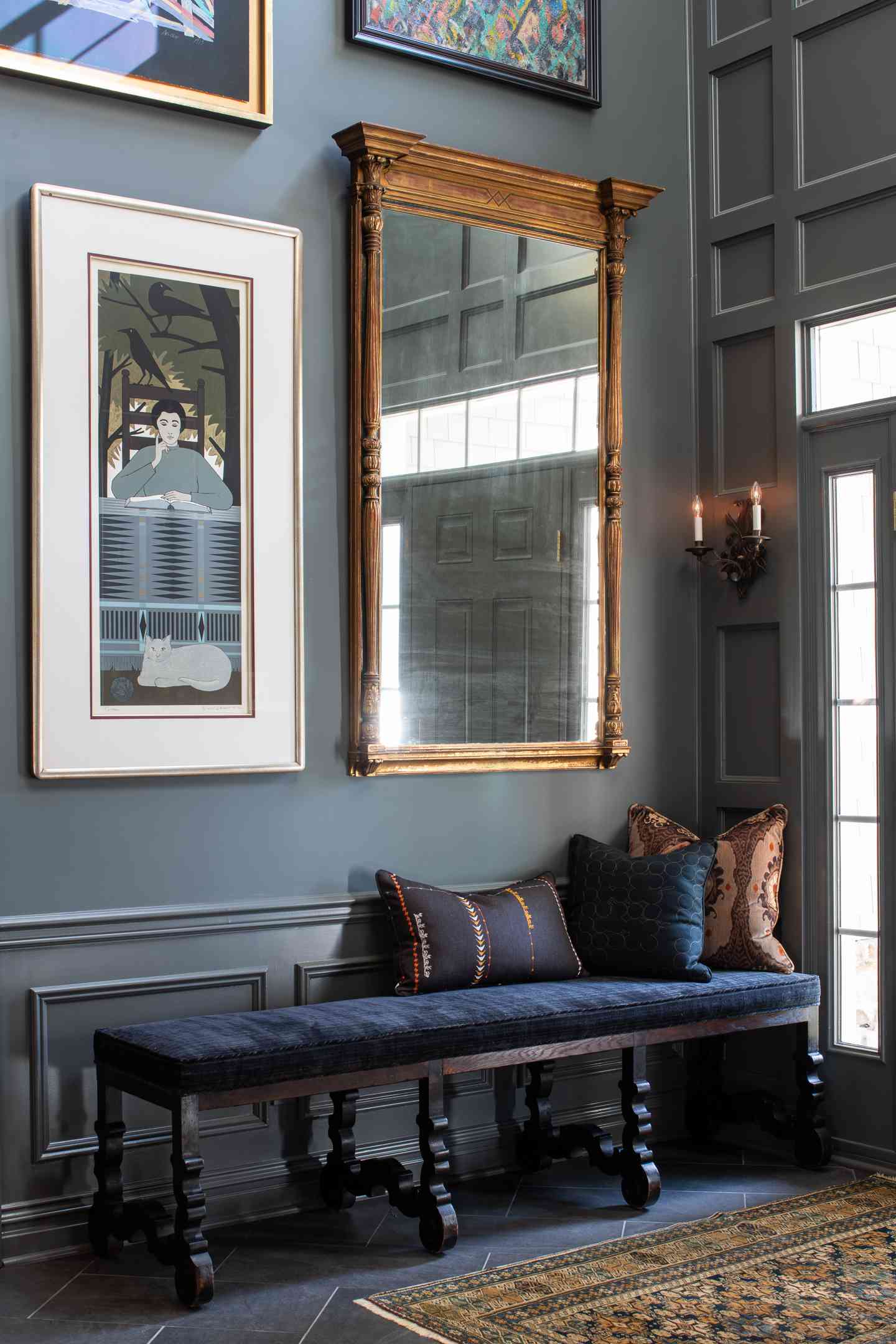 Slate blue hallway with blue decor.