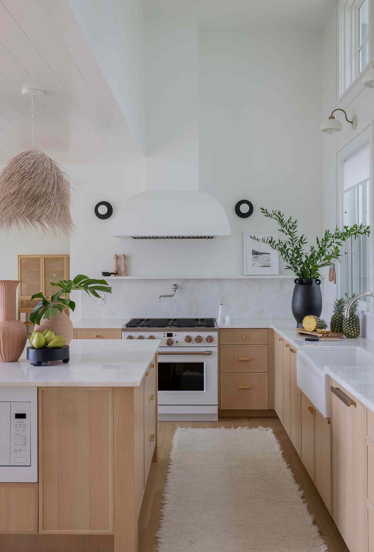 wood kitchen with white appliances