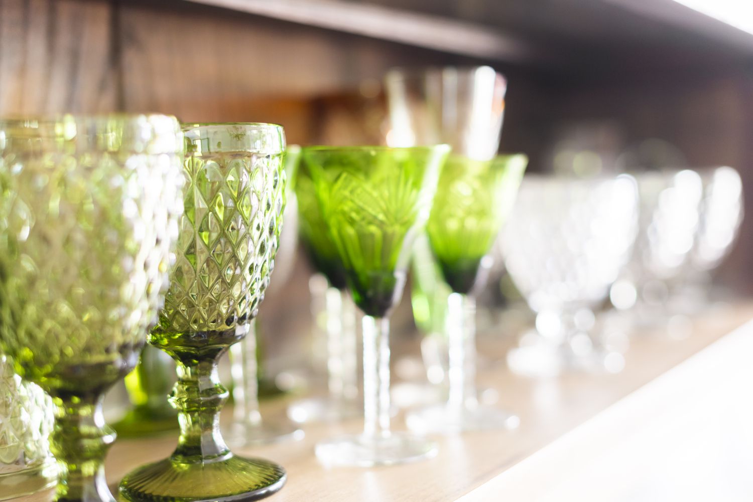 Wooden cupboard of vintage glassware