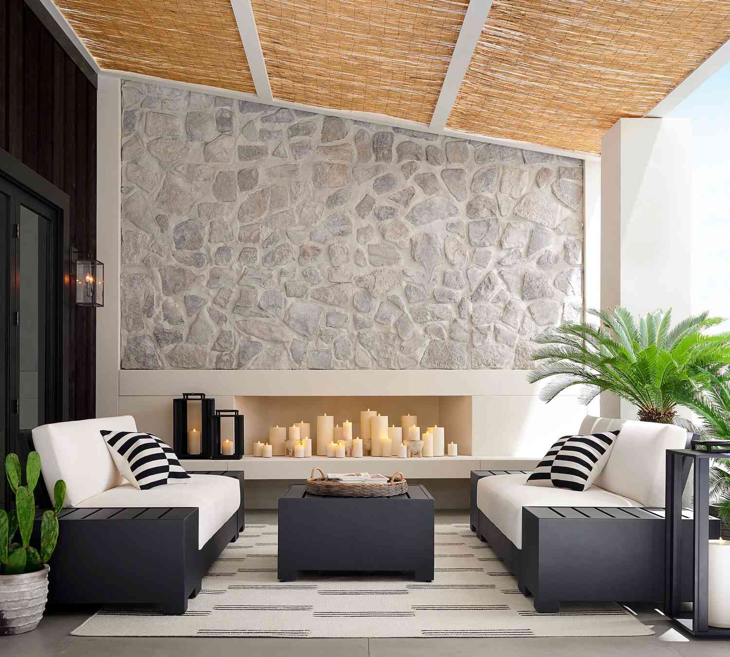 Faux candles in outdoor fireplace