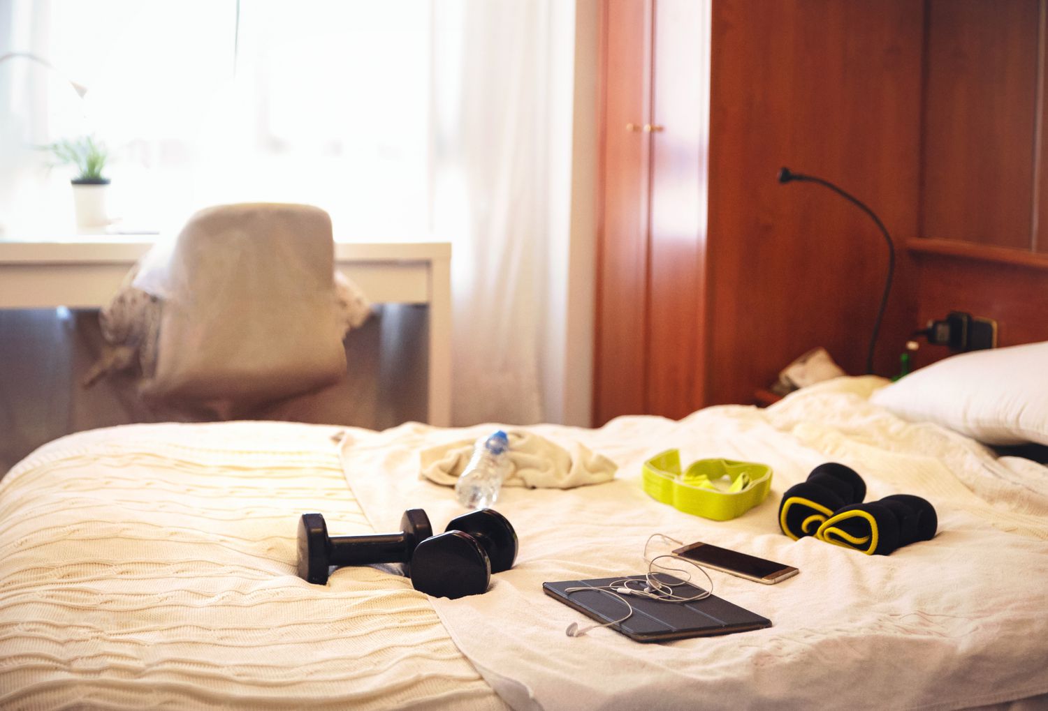 set of weights on bed 